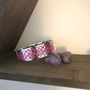 Pink coach cuff. Looks brand new.